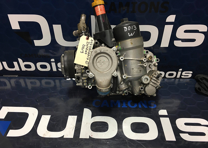 Oil coolant module